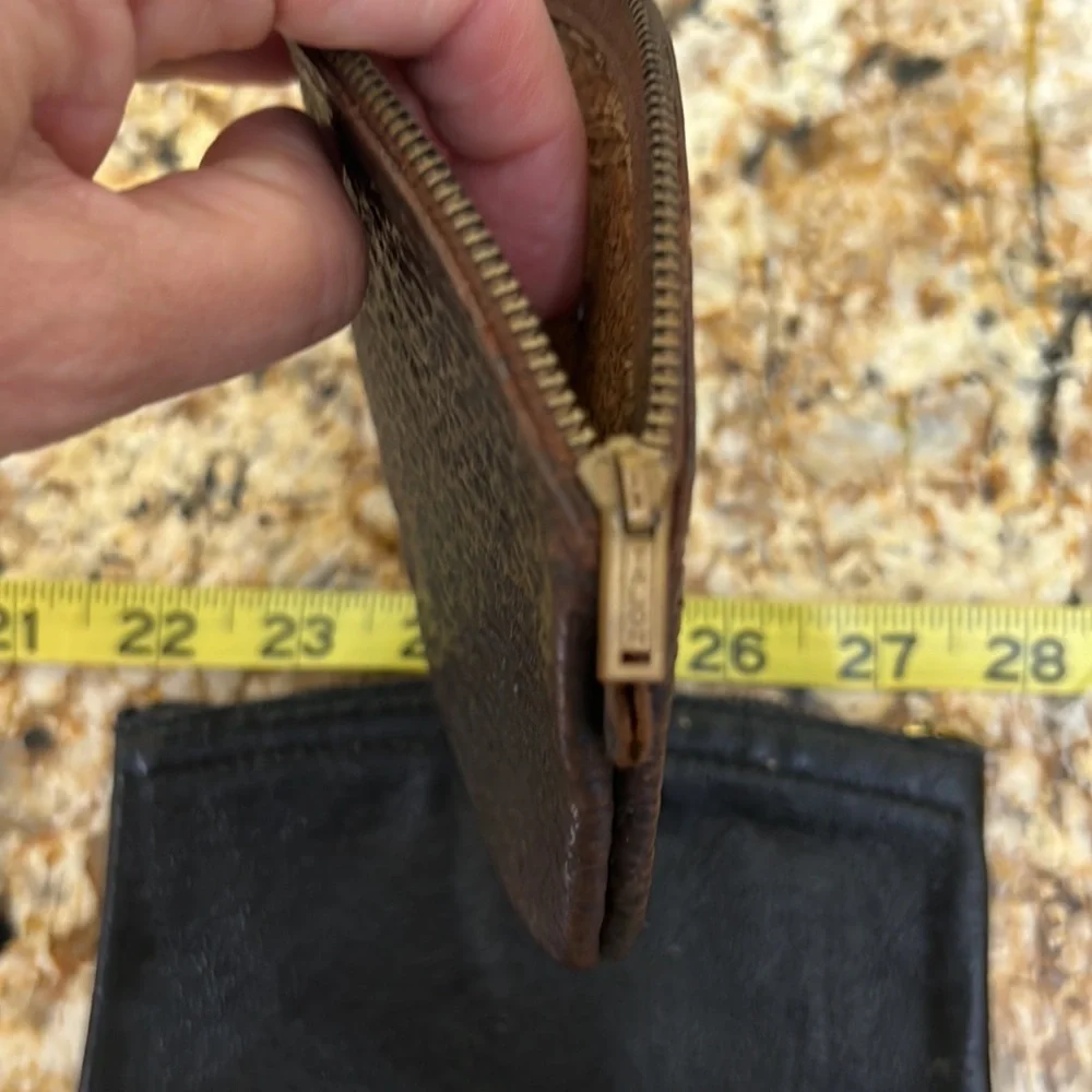 Vintage two leather wallets .